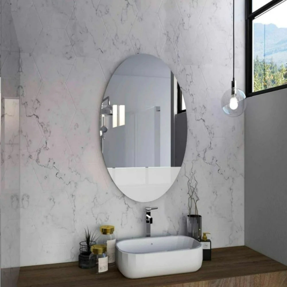 "Monterrey Mirror: Elegant and Frameless Oval Mirror for a Stunning Reflection"