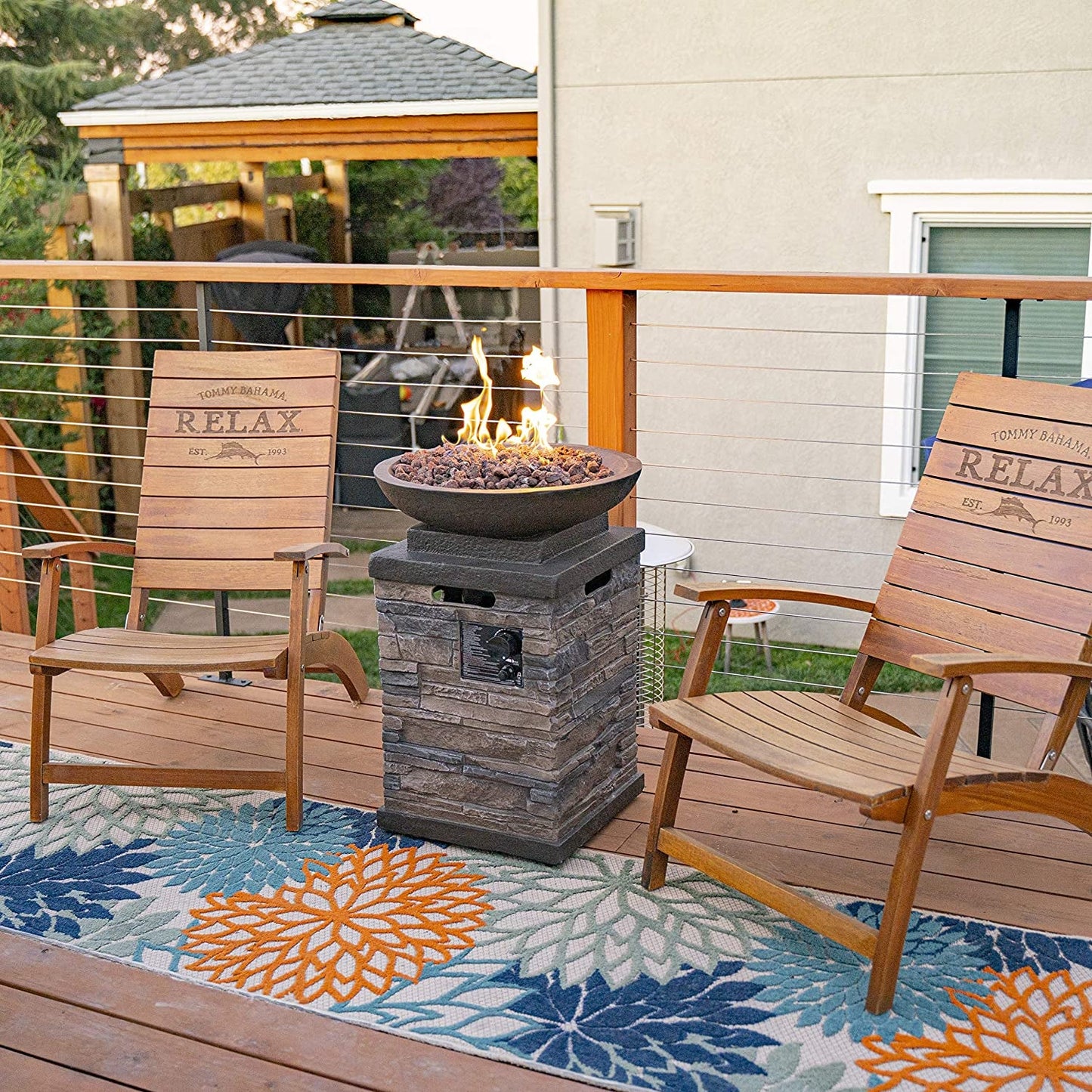 "Enhance Your Outdoor Ambiance with the Newcastle Propane Firebowl Column - Realistic Look Firepit Heater with Lava Rock, 40,000 BTU Outdoor Gas Fire Pit - Experience the Beauty of Natural Stone!"